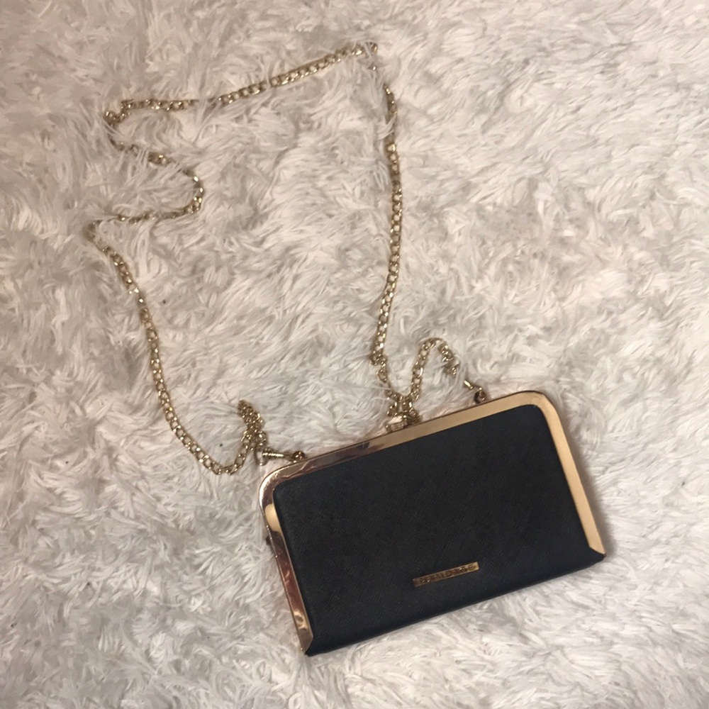 Black and gold chain handle clutch